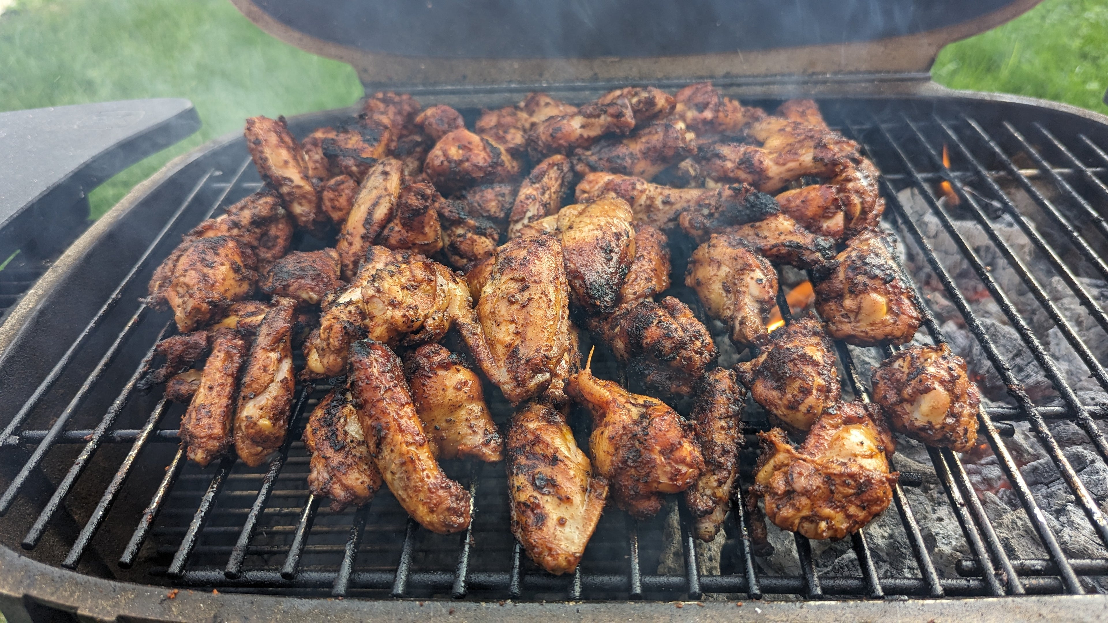 BBQ grilled chicken wings featuring Mike’s BBQ Rub products including rubs sauces and snacks